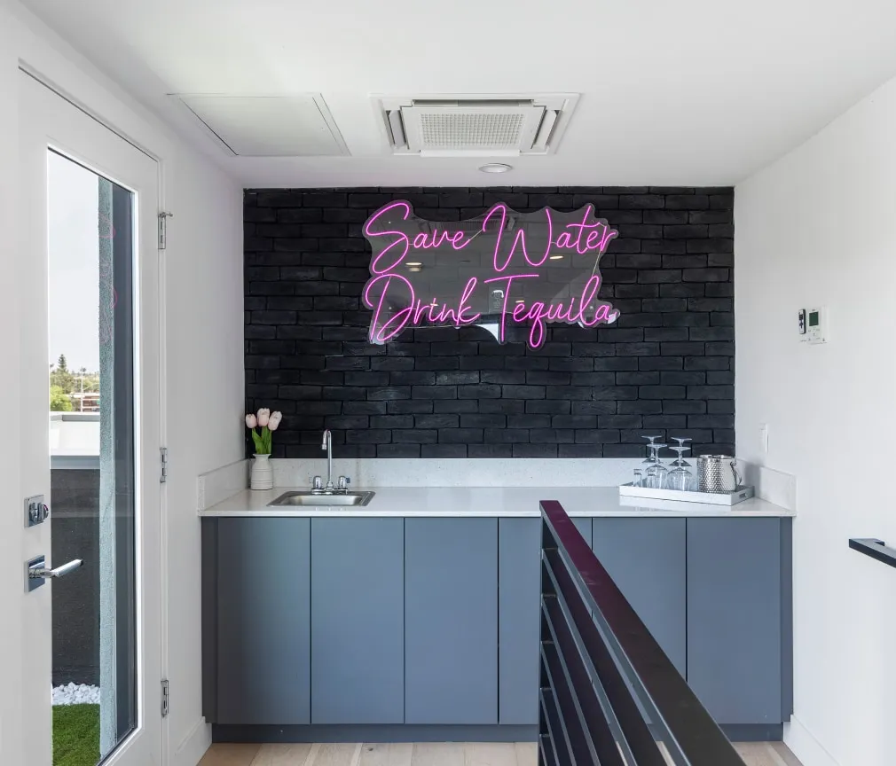 4-station vanity/makeup area with backlit mirrors and convenient wet bar